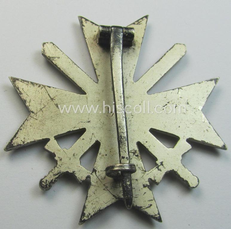 Attractive - and just moderately used! - example of a: 'Kriegsverdienstkreuz 1. Kl. mit Schwertern' being a maker- (ie. 'L/11'-) marked (and/or: 'Buntmetall'-based!) specimen that came as issued and/or stored for decades