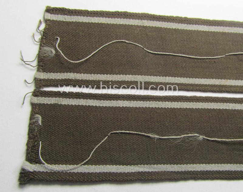 Superb - and scarcely encountered! - example of a WH (Heeres) cuff-title ie. armband (ie. 'Ärmelstreifen') entitled: 'Feldgendarmerie' (being a typical 'semi-BeVo'-woven!) example that comes in a full length- ie. non-shortened, condition