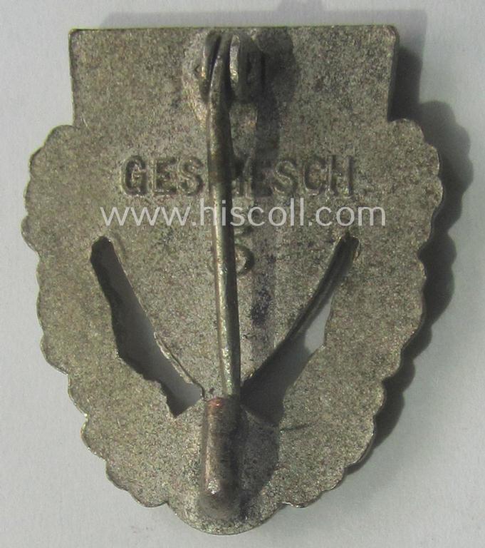 Honorary-membership-lapel-pin (aka: 'Goldene Ehrennadel für 40 Jahre Mitgliedschaft im Nationalsocialistischer Reichskriegerbund' (ie. 'N.S.R.K.B.') being a maker- (ie. '5'-) marked example that also bears a: 'Ges.Gesch.'-designation