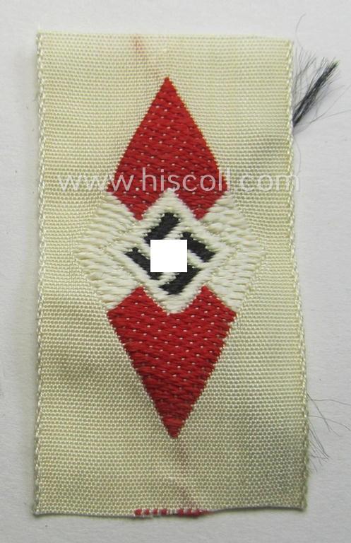 HJ (ie. 'Hitlerjugend') cap-badge (ie.: 'Raute') as executed in 'BeVo'-weave-pattern