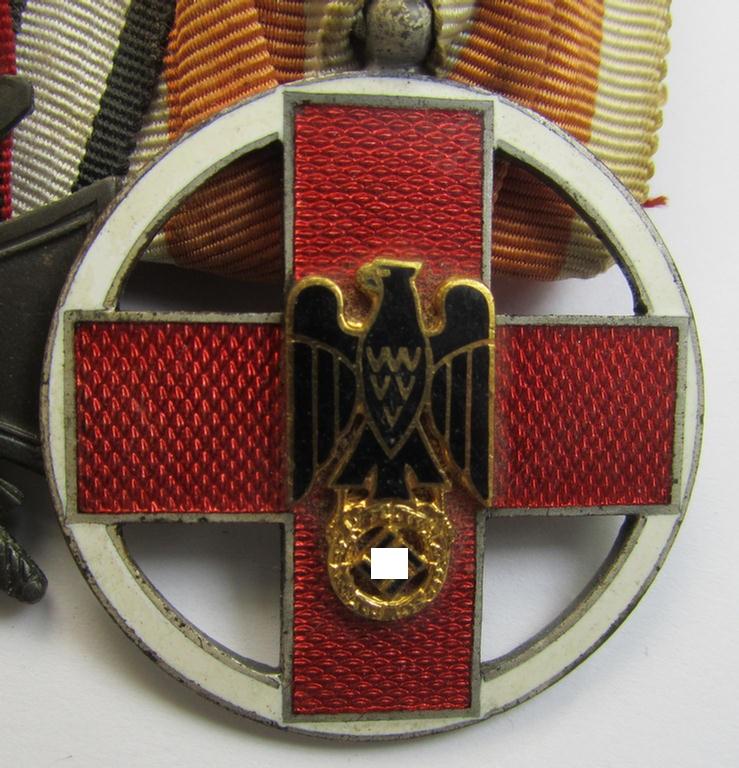 Attractive, WWI- (ie. TR-) period so-called: 'Ordenspange' (being of the non-'detachable-pattern') showing resp. an: 'EK II. Kl.'. a: 'FKK 1914-18 mit Schw.' and a (scarcely seen!): 'DRK-Ehrenzeichen des 3. Modell'