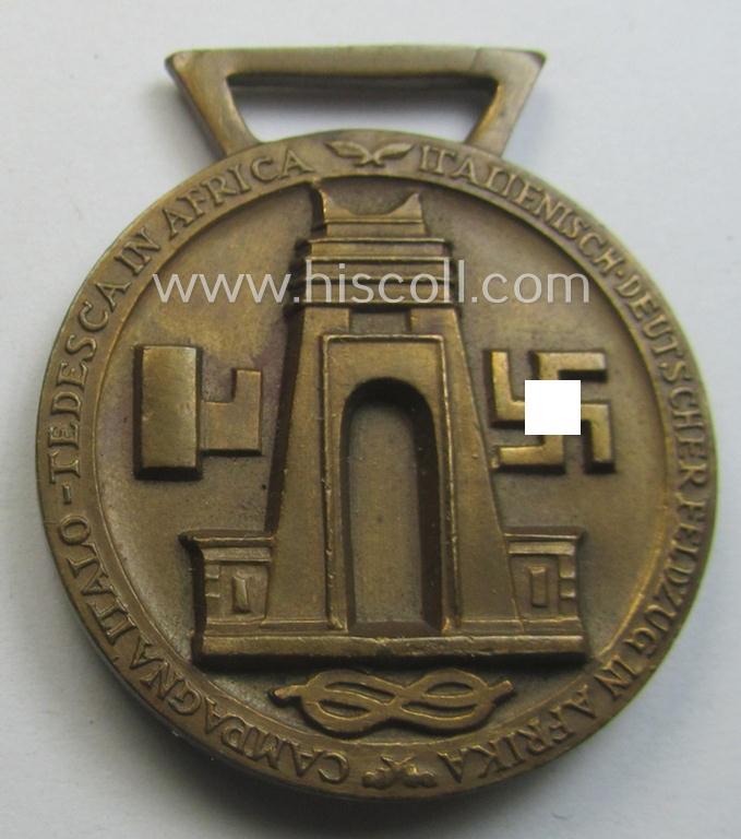 Stonemint medal-set: 'Deutsch-Italienische Feldzugsmedaille' (or: German-Italian campaign-medal) being a maker- (ie. 'Lorioli - Milano'-) marked specimen that comes as issued