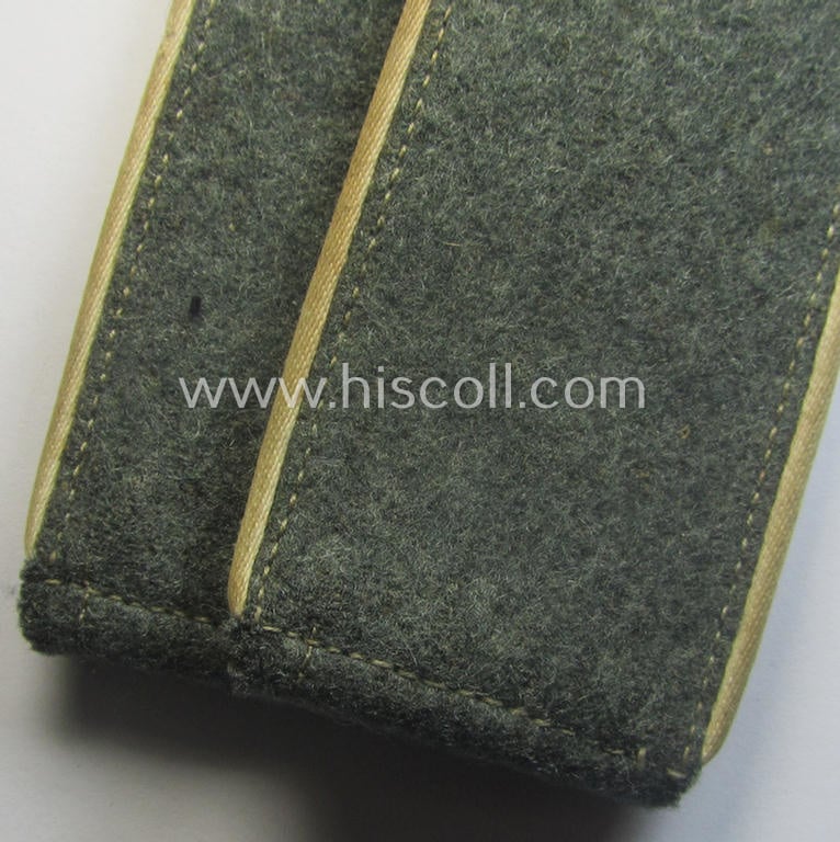 Pair of WH (Heeres), early- (ie. mid-) war-period- (ie. 'M41- o. M43'-) pattern EM-type shoulderstraps as piped in the white-coloured branchcolour as was intended for a: 'Soldat eines Infanterie-Rgts.'