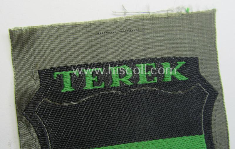 'BeVo'-type armshield (of the second pattern) entitled: 'Terek' being a piece as was intended for a volunteer who served within the 'Deutsche Wehrmacht' ie. within the 'Terek-Kosakken'