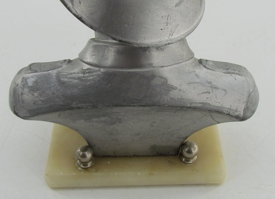 “German Wehrmacht soldier bust desk decoration on marble base.”