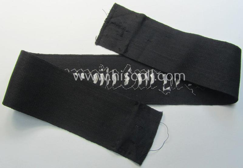 WH (Heeres) related cuff-title (ie. 'Ärmelstreifen') being a typical black-coloured- and linnen-based example showing the (neatly silver-toned- and 'flatwire'-woven!) text that reads: 'Propagandakompanie'