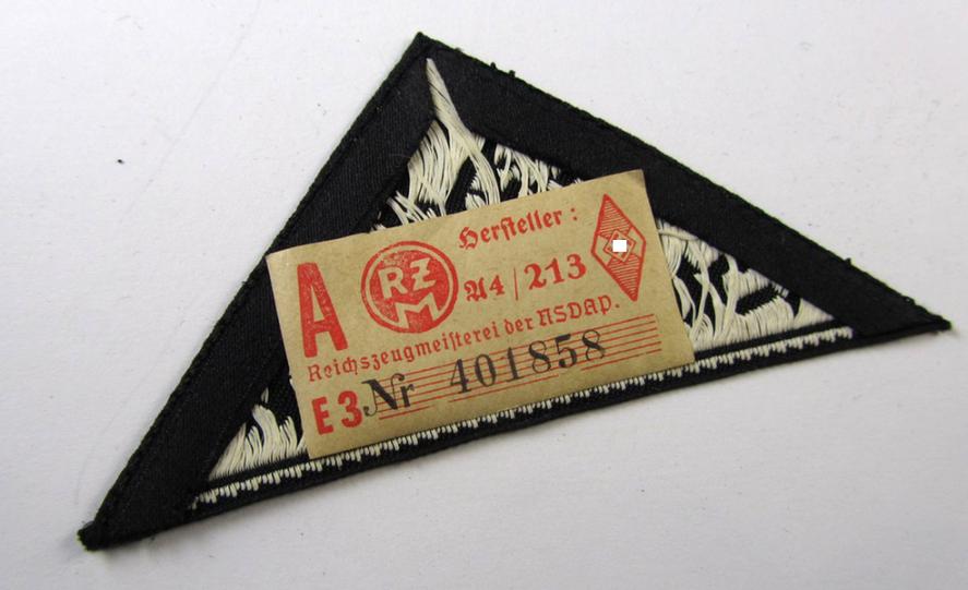 Very nice - and scarcely encountered! - HJ/BDM ('Hitlerjugend'/'Bund Deutscher Mädel') district-triangle entitled: 'Südost Steiermark', still having its original paper 'RzM'-etiket attached - very nice (IMO mint-/unissued!) condition!