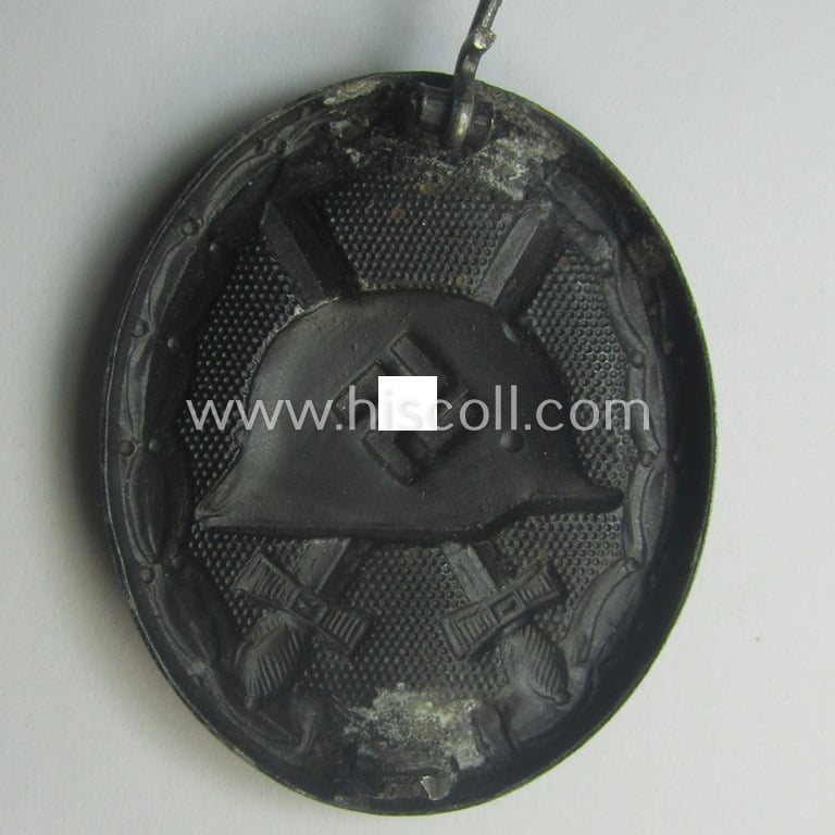 Neat - albeit non-maker-marked and typical magnetic! - example of a black-class wound-badge (or: 'Verwundeten-Abzeichen in Schwarz') that comes in an overall nice- (ie. I deem just minimally used-), condition