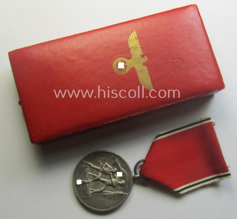 WH Austrian-occupation- (ie. 'Anschluss'-) medal: '13. März 1938' being a very attractive (and minimally tarnished) example that comes stored in its bright-red-coloured- and/or nicely maker-marked etui as issued