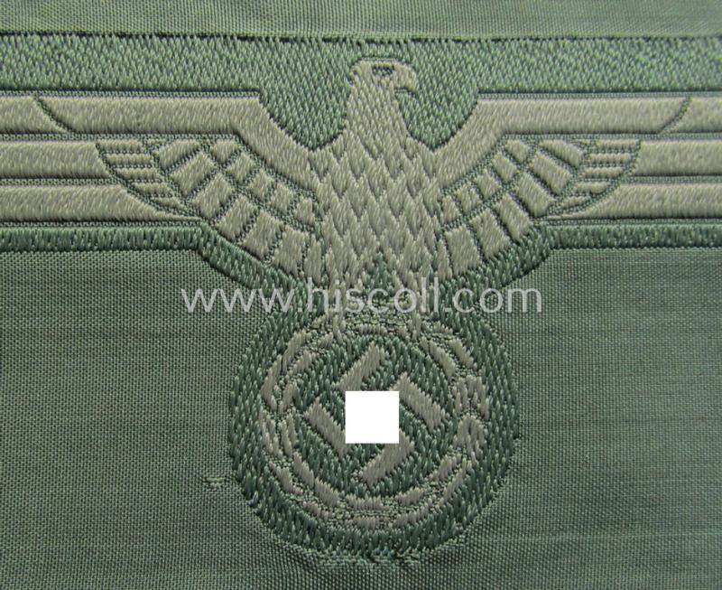 WH (Heeres) related breast-eagle (ie. 'Brustadler für Mannschaften u. Uffz. des Heeres') being a 'standard-issue'-pattern-example as executed in the 'BeVo'-weave-pattern on a field-grey-coloured background
