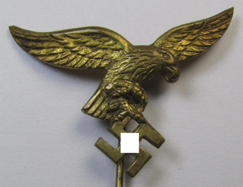 Bright-golden-toned lapel-pin (ie. 'Zivilabzeichen') to be worn on the civil attire as was intended for usage by the various staff-members of the 'Luftwaffe' (depicting an early-pattern- ie. 'down-tailed'-eagle)