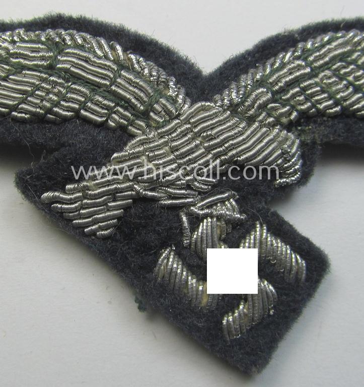 WH (Luftwaffe) officers'-pattern visor-cap-eagle (ie. 'Adler für LW-Offiziers-Schirmmütze') being a neatly hand-embroidered example of the: 'Extra Qualität' that comes in a 'virtually mint ie. unissued'-), condition