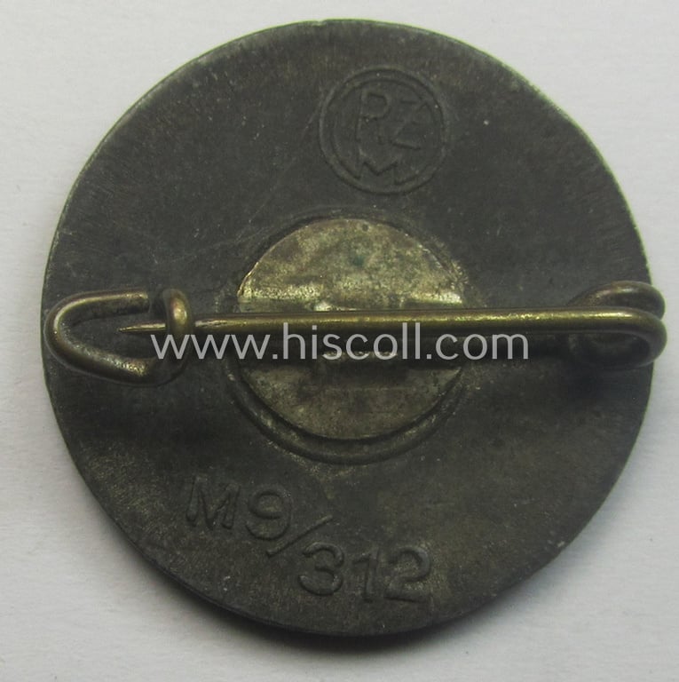 Very late-war, 'painted- (ie. sprayed'-) pattern 'N.S.D.A.P. - Parteiabzeichen' showing the (rarely seen!) makers'-designation: 'RzM' and/or: 'M9/312'