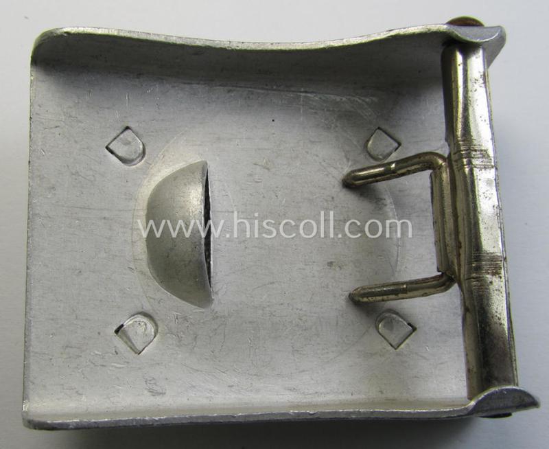 Superb, WH (Luftwaffe) 'standard'-pattern, aluminium-based (dress- ie. 'Ausgeh'-pattern) belt-buckle (ie. 'Koppelschloss für Mannschaften u. Uffz. der LW') being a typical non-maker-marked example that comes in a wonderful condition