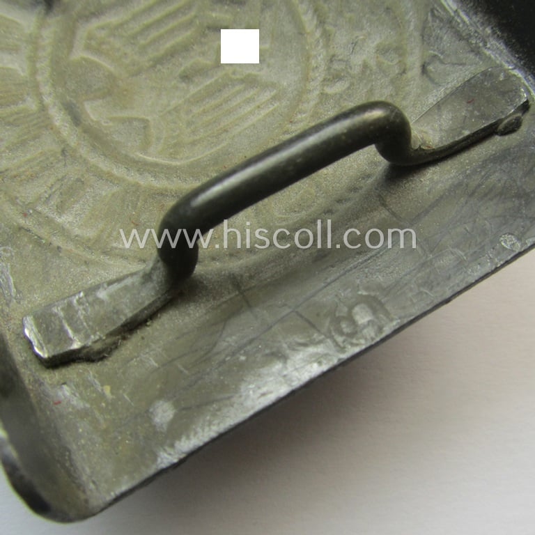 Moderately used, WH (Heeres) field-grey-coloured- and/or typical steel-based belt-buckle being a maker- (ie. 'GB') marked example