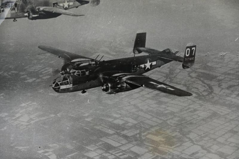 US WW2 Press Photo 'Flak damaged Bomber'