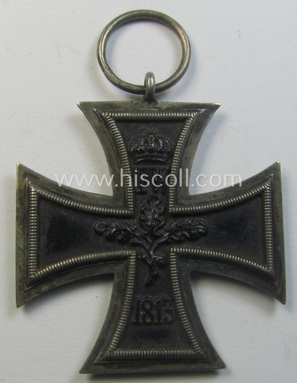 Attractive, WWI-period: 'Eisernes Kreuz II. Klasse' (or: iron cross second class) being a maker- (ie. 'KO'-) marked example that comes together with its (minimally) confectioned piece of ribbon (ie. 'Bandabschnitt')