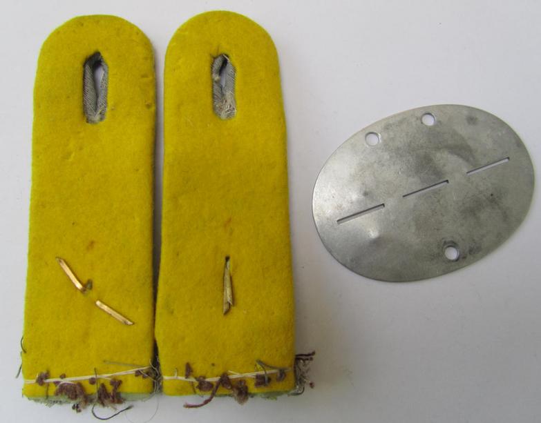 Unusual insignia-grouping, comprising of a matching pair of WH (Heeres) officers'-type shoulderboards as used by an: 'Oberleutnant eines Nachrichten-Rgts.' that comes with its accompanying ID-disc (bearing the stamped unit-designation: '3.N.A.3'...