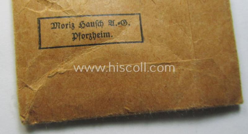 Attractive medal-set: 'Deutsches Schutzwall Ehrenzeichen' (aka: 'Westwall'-medal) being a typical non-maker-marked- and/or 'Buntmetall'-based specimen that comes packed in its original pouch of issue by the: 'Moritz Hausch A.G.'-company