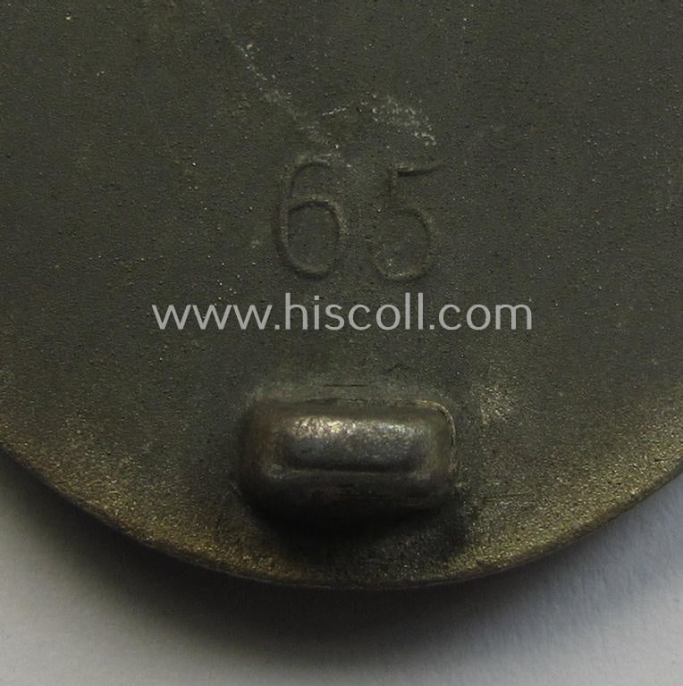 Moderately used- and/or worn 'Verwundeten-Abzeichen in Silber' being a typical maker- (ie. '65'-) marked- and/or: 'Feinzink'-based example by the maker: 'Klein & Quenzer'