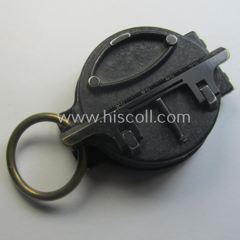 'Standard-issue'-pattern and/or (typical) black-coloured (and/or partly aluminium-based!), WH compass (ie. 'Marschkompass') being a non-marker-marked example that is individually numbered: '71638'