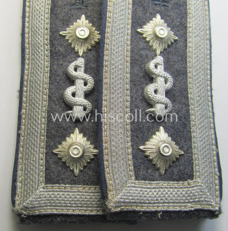 Superb - and/or fully matching! - neatly 'cyphered' pair of WH (Luftwaffe) NCO-type shoulderstraps as piped in the darker-blue-coloured branchcolour as was intended for an: 'Oberfeldwebel der Sanitäts-Truppen'