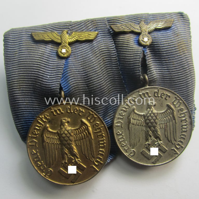2-pieced medal-bar (ie. 'Spange') showing two: WH (Heeres o. Kriegsmarine) so-called: 'Dienstauszeichnungen für 4 u. 12 Jahre Treue Dienste' that both come period-mounted as a so-called: 'Doppelspange'