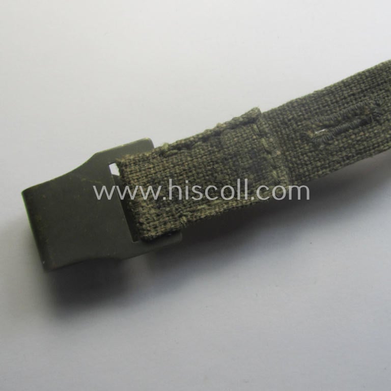 Complete, 2-pieced 'standard-issue'-pattern- (ie. typical WH-issue) carrying-strap (ie. 'Tragelasche') as was intended for the various gasmask-containers (being a maker-marked example that comes in a just minimally used, condition)