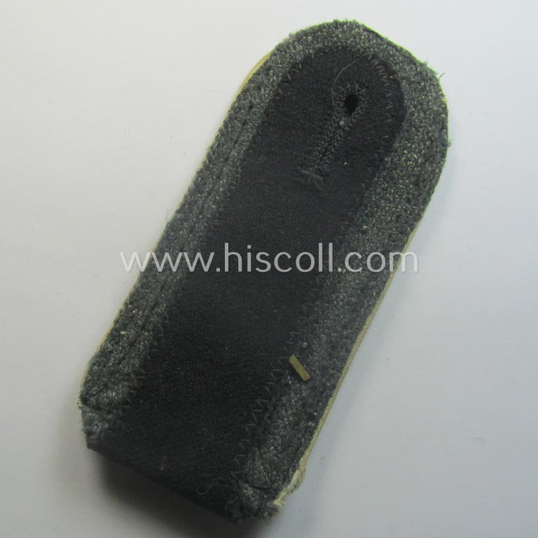 Single, Waffen-SS NCO-type and neatly 'cyphered' shoulderstrap as piped in the white-coloured branchcolour as was intended for usage by an: 'SS-Oberscharführer' who served within the: SS-Rgt. 'Deutschland' (2. SS-Pz-Div. "Das Reich")