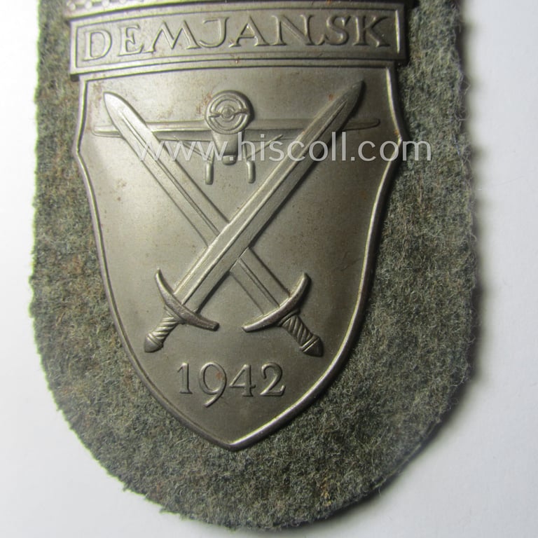 Stunning - and still 'virtually mint'! - WH (Heeres ie. Waffen-SS) 'Demjansk'-campaign-shield as executed in typical magnetic, so-called: 'Eisenblech'