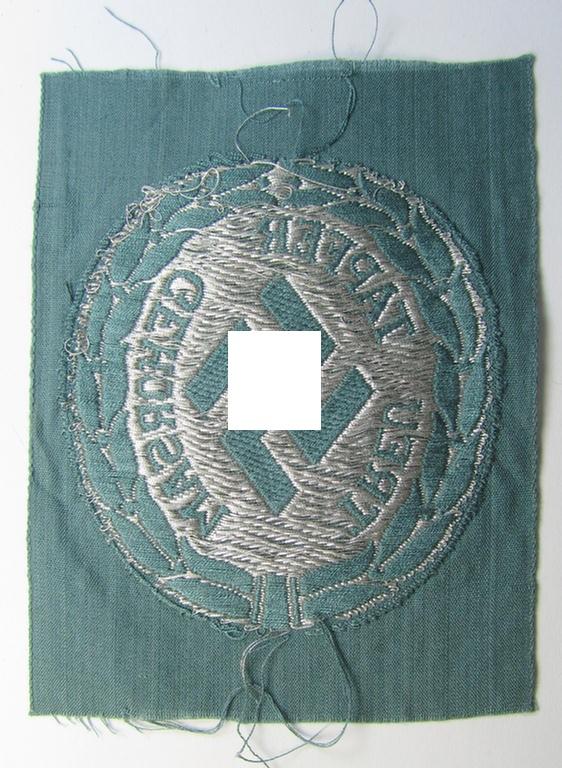 Superb - and actually rarely encountered! - officers'- (ie. evt. NCO-) type, so-called: 'Schutzmannschaften'- (ie. 'Schuma'-) armshield being executed in silver-grey-coloured 'flatwire'-thread onto a police-green-coloured background