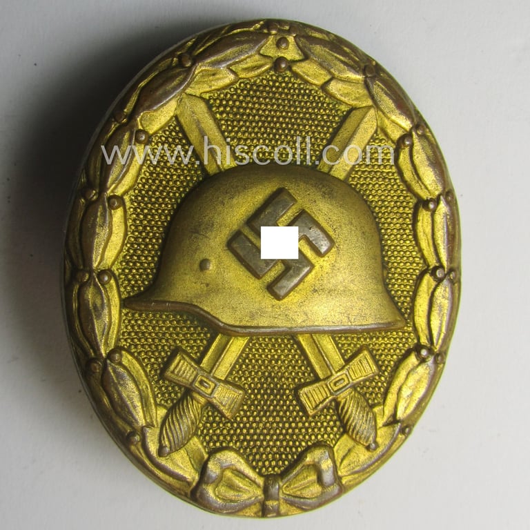 'Verwundeten-Abzeichen in Gold' being a non-maker-marked- and typical 'Buntmetall'-based (ie. 'thin-pinned'!) example that comes stored in its maker- (ie. 'Hauptmünzamt - Wien'-) marked etui as issued