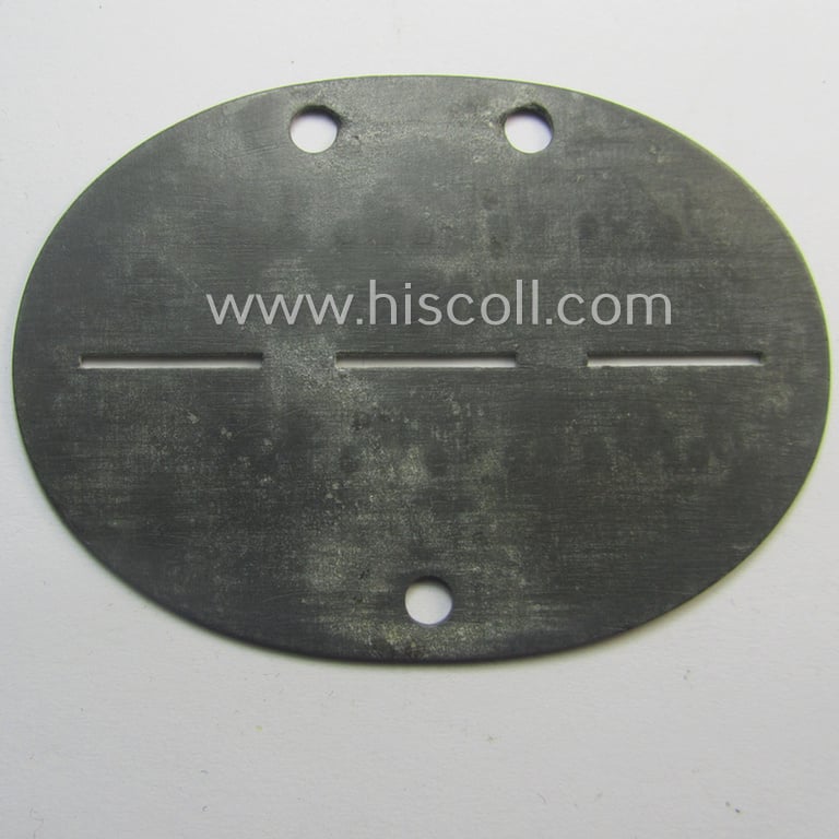 Zinc-based, WH (Heeres) 'Gebirgsjäger'-related ID-disc bearing the clearly stamped unit-designation that reads: '3./G.J.E.R. 138' and that comes as issued and/or worn