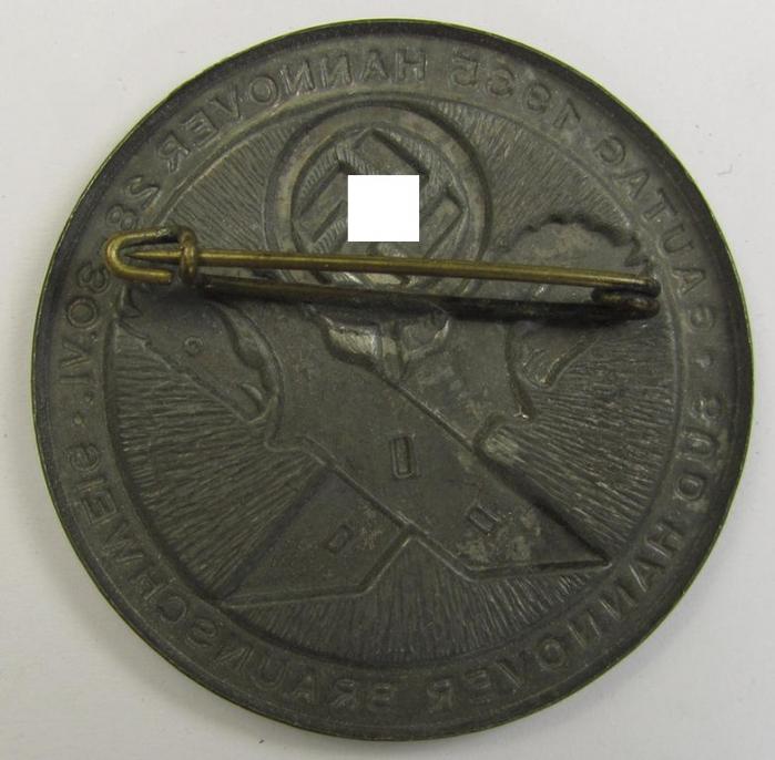Detailed and pronounced, silverish-grey-coloured, N.S.D.A.P.-related day-badge (ie. 'tinnie' or: 'Veranstaltungsabzeichen') as was issued to commemorate the: 'Gautag 1935 - Hannover - 28.-30-1935 - Süd-Hannover-Braunschweig'