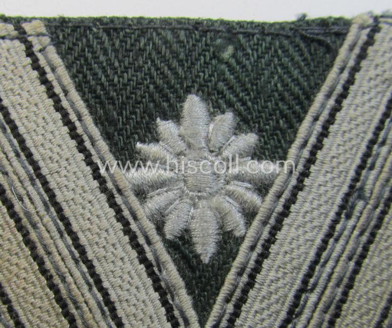 WH (Heeres) 'Armwinkel' (or: arm-chevron) as executed on typical field-grey-coloured wool as was specifically intended for usage by a soldier with the (unusually seen!) rank of: 'Stabsgefreiter'