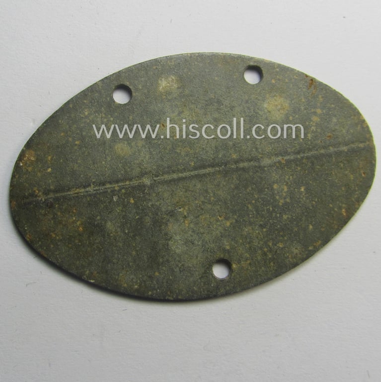 Later-war- (albeit 'standard-issue'-) pattern, WH (Kriegsmarine) typical zinc- (ie. 'Feinzink'-) based- and greyish-toned ID-disc (ie. 'Erkennungsmarke') bearing the engraved coded numeral (ie. text) that reads: '3 M 5 28 Flum'