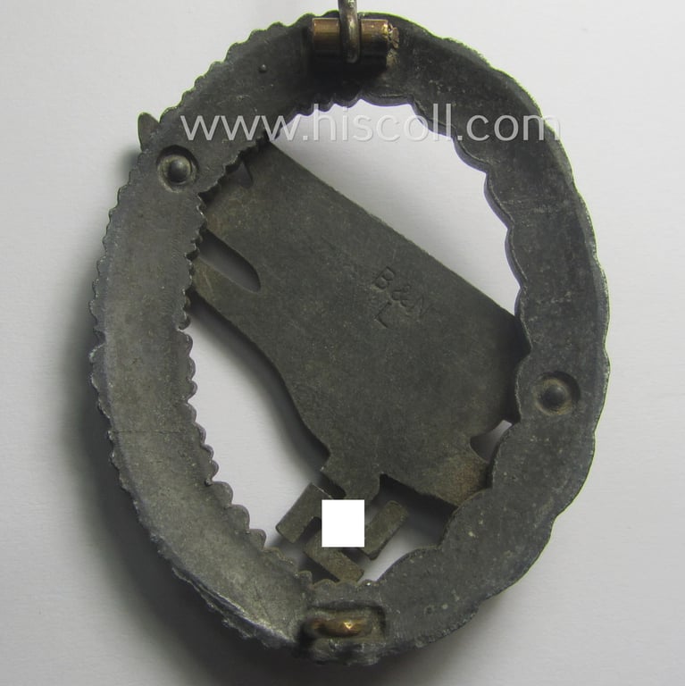 WH (Luftwaffe) 'Fallschirmschützen-Abzeichen' (or: paratroopers-jumpbadge) being a maker- (ie. 'B&N - L'-) marked- and typical zinc- (ie. 'Feinzink'-) based example by: 'Berg u. Nolte'