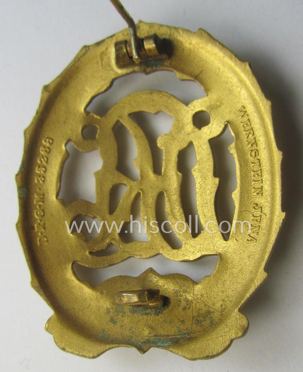 'Virtually mint' - and truly rarely found! - example of a: 'Reichssportabzeichen DRL in Gold' (or: DRL sports'-badge in gold) being a just moderately worn- ie. used example that is nicely maker- (ie. 'Wernstein - Jena'-) marked on its back