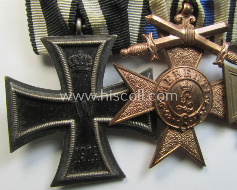 Attractive, 4-pieced medal-bar (ie. 'Ordenspange') respectively depicting a WWI-period: 'EK II. Klasse', a: 'Bayern Militär-Verdienstkreuz 3. Klasse m. Schw.', a: 'FKK 1914-18 m. Schw.' and an: Austrian 'Anschluss'-medal