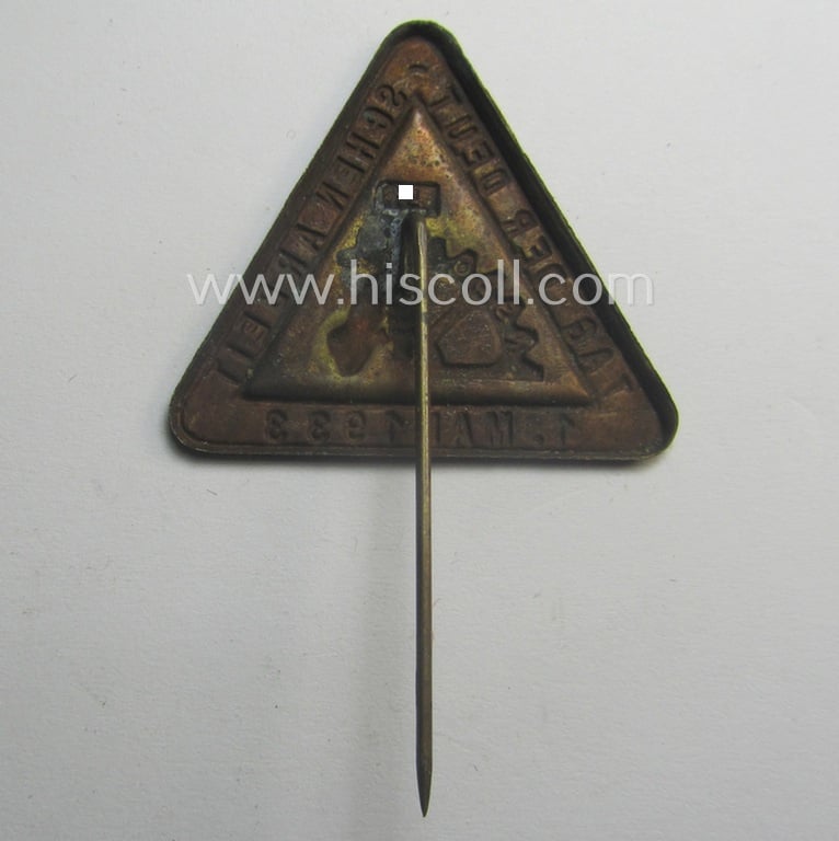 Unusually seen, commemorative D.A.F.- (ie. N.S.B.O.-) related day-badge (ie. 'tinnie') as issued to commemorate a specific D.A.F. (ie. N.S.B.O-) related gathering simply named the: 'Tag der Deutsche Arbeit - 1. Mai 1933'