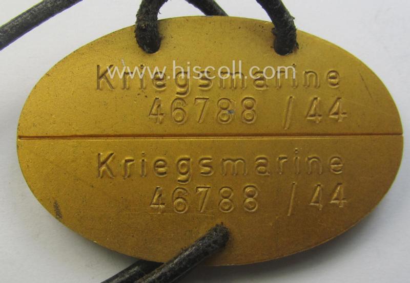 Later-war- (albeit 'standard-issue'-) pattern, WH (Kriegsmarine) typical aluminium-based- and/or bright golden-bronze toned ID-disc (ie. 'Erkennungsmarke') bearing the engraved coded numeral (ie. text) that simply reads: 'Kriegsmarine 46788/44'
