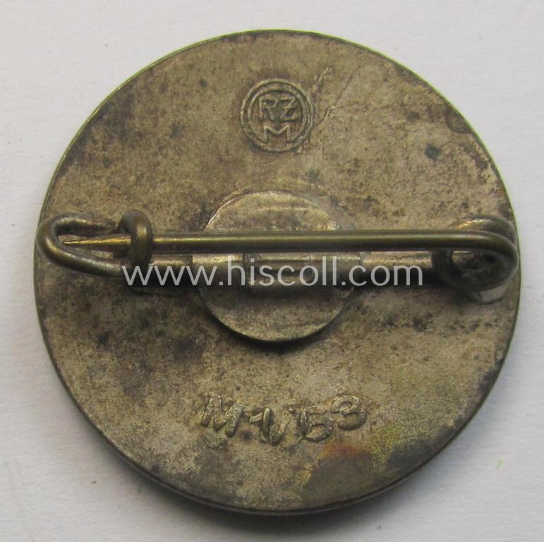 Neat - bright-red-coloured and nicely preserved! - 'N.S.D.A.P.'-membership-pin- ie. party-badge (or: 'Parteiabzeichen') which is maker-marked on its back with the makers'-designation: 'RzM' and/or: 'M1/63'