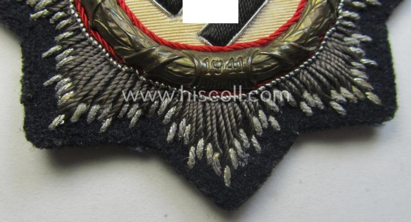 Black-toned, WH (Heeres o. Waffen-SS 'Panzer' ie. Kriegsmarine-related-) 'Deutsches Kreuz im Gold in Stoff' (ie. cloth-based DKiG or German Cross in gold)