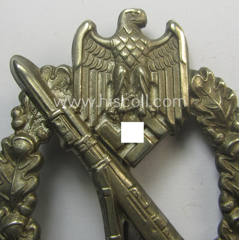 'Infanterie Sturmabzeichen in Silber' being an unmarked, 'variant'-pattern-example as executed in 'hollow-styled', silverish-toned metal (ie. 'nickle') as was produced by the: 'C.E. Juncker'-company