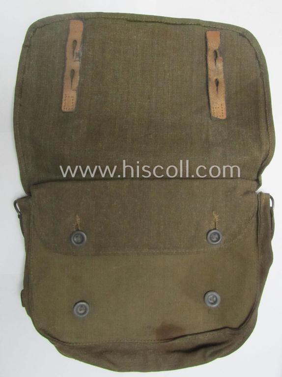 Mid- ie. later-war-period - somewhat smaller-sized and female-related - so-called: 'Brotbeutel für Nachrichtenhelferinnen' that comes mounted onto its period carrying-strap and that comes in an overall nicely preserved, condition