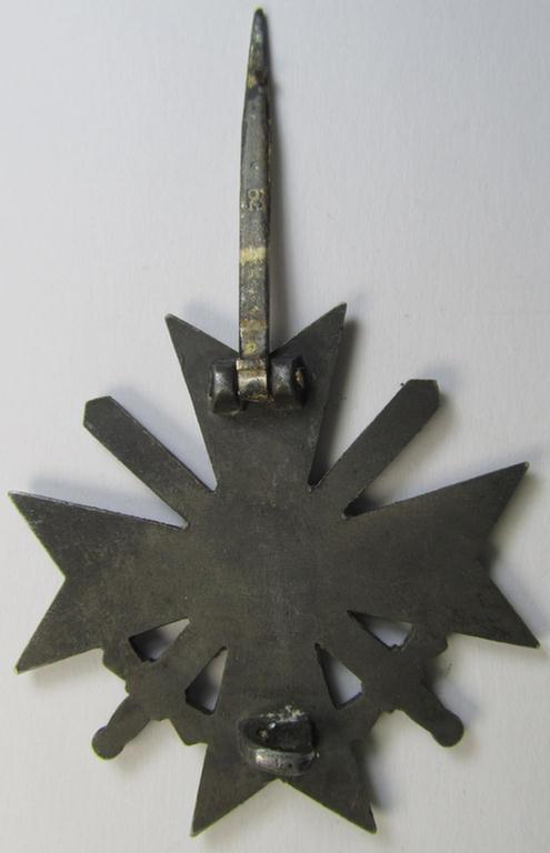 'Kriegsverdienstkreuz 1. Klasse mit Schwerter' (being a maker- ie. '62'- (ie. by: 'Kerbach & Oesterhelt'-) marked specimen that is executed in silverish-grey-coloured and/or (typical) zinc-based metal (ie. 'Feinzink')