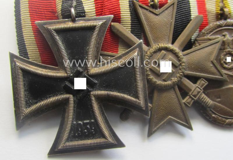 4-pieced, WWII-period medal-bar (ie. 'Ordenspange') showing resp. an: 'EKII.Kl.', a: 'KvKII.Kl. m. Schw.', a: 'Westwall'-medal and a: 'Medaille Winterschlacht im Osten 1941-42'