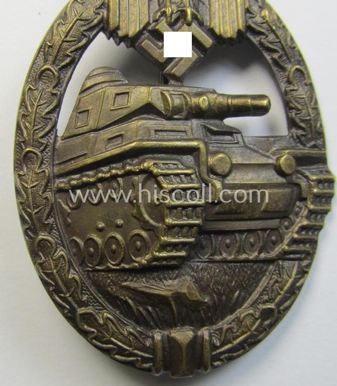 Superb - and actually scarcely encountered! - example of a: 'Panzerkampf-Abzeichen in Bronze' being a typical 'hollow-back', non-maker-marked- (and/or: 'Buntmetall'- ie. 'Tombak'-) based example as was procuced by the: 'Karl Würster'-compan...