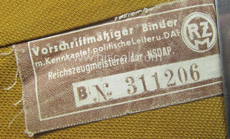 Unusually found, 'generic'-styled, N.S.D.A.P.- (ie. 'politischen Leiter'-related!) linnen-based tie ('Krawatte o. Binder') being a 'virtually mint- ie. unissued' example that still retains is period (linnen-based) 'RzM'-etiket