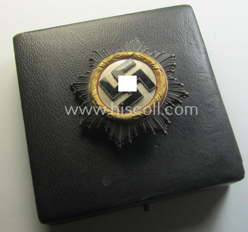 Stunning, maker- (ie. '20'-marked-) example of WH (Heeres, LW etc.) 'Deutsches Kreuz im Gold' (or DKiG) being a (regular- ie. 'light-weight') piece that was produced by the: 'C.F. Zimmermann'-company and that comes stored in its period etui